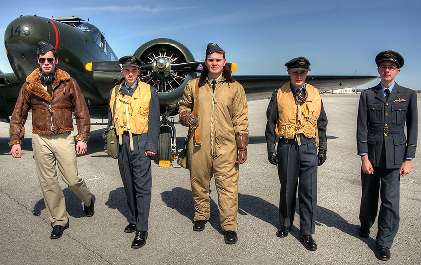 Photo of reenactor volunteers at the CWHM portraying military and civilian roles from various periods of aviation history