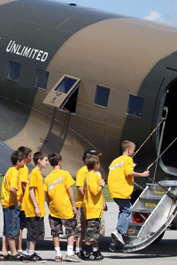 Kids entering a plane